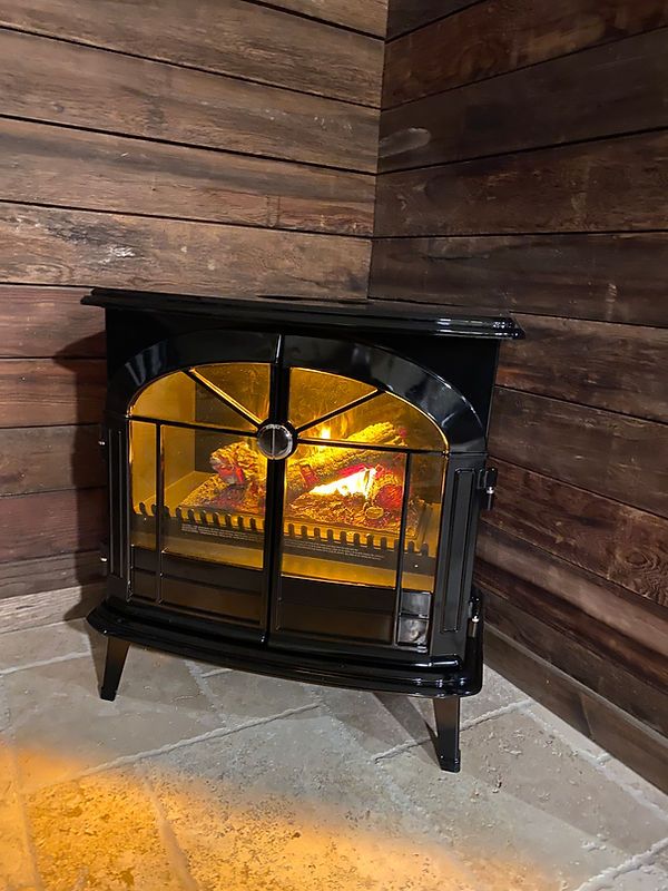 The suite's cozy stove corner, glowing warm